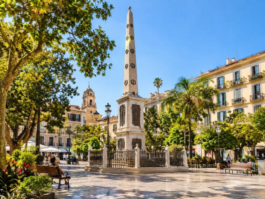 Plaza de la Merced in Málaga with its obelisk and trees
